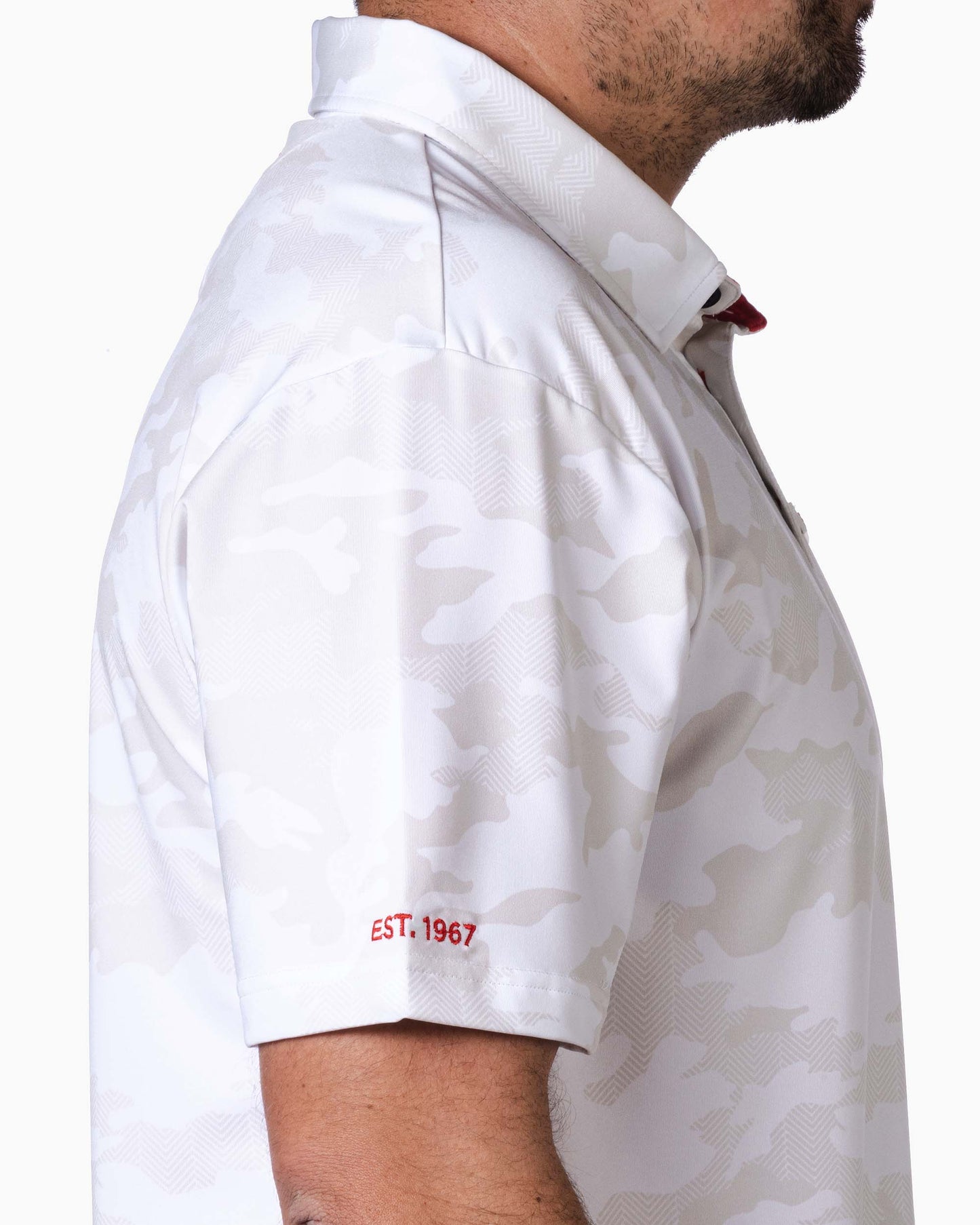 close up of sleeve with embroidered red "est. 1967"