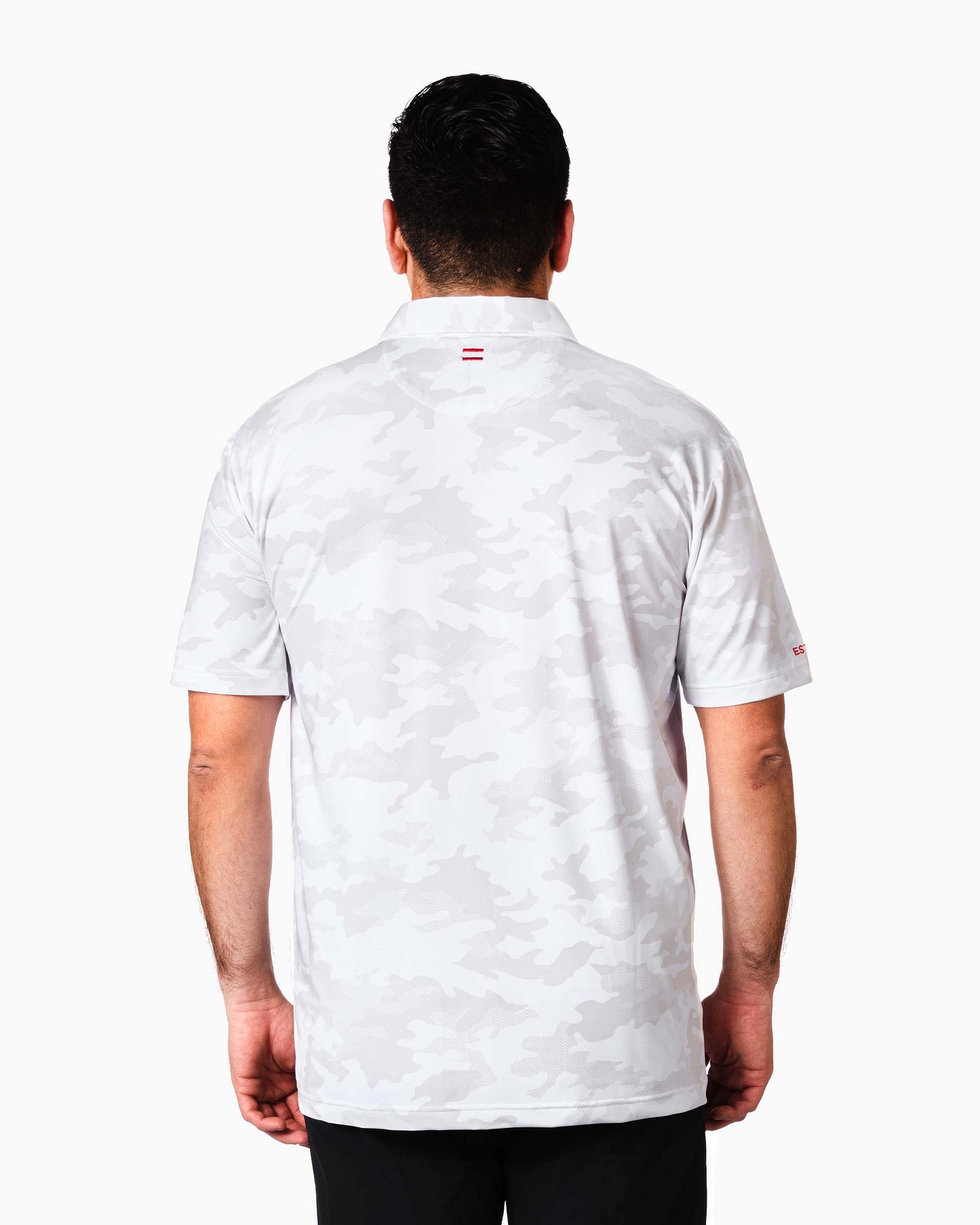 back of man wearing polo with two red woven stripes at top