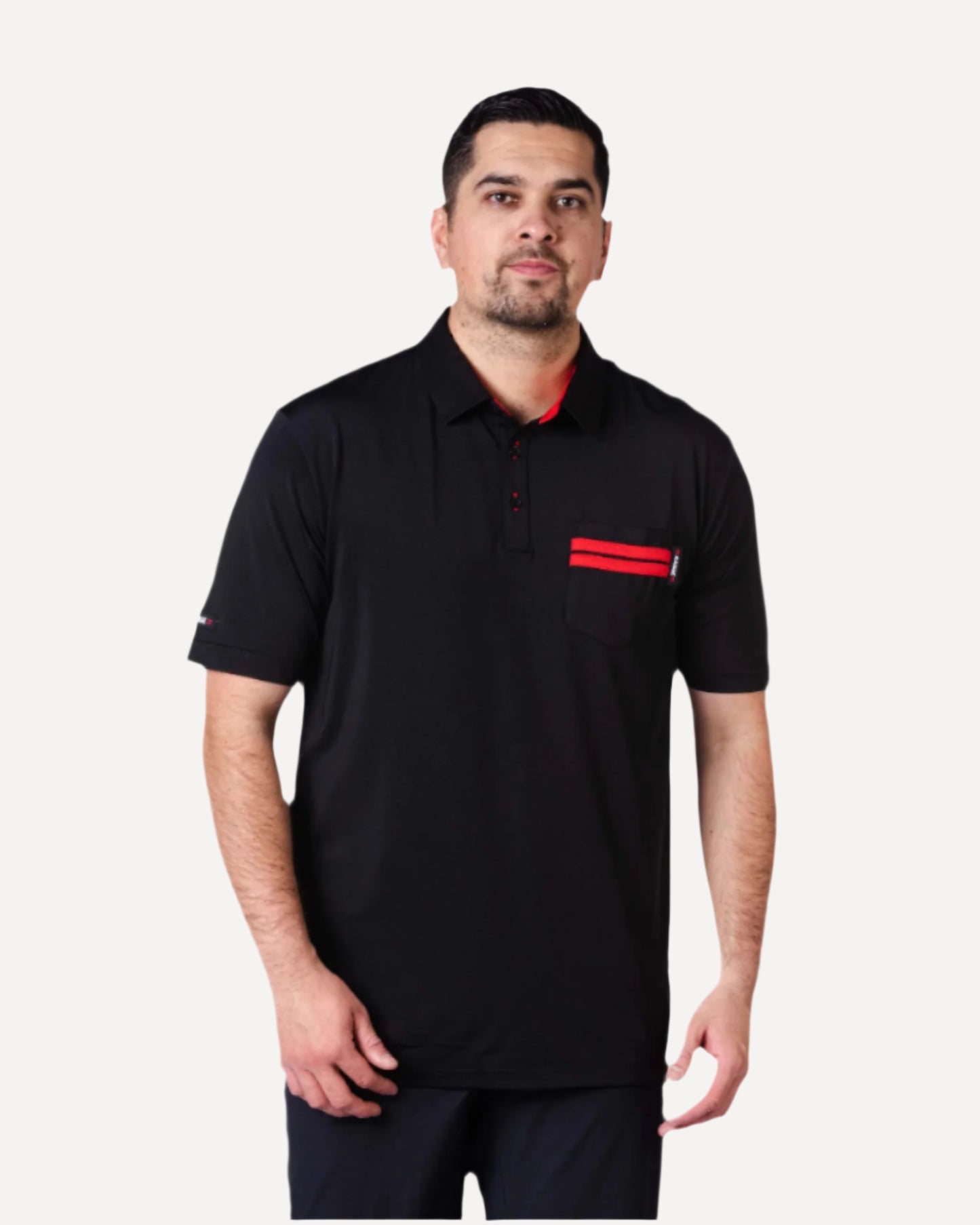 man wearing black polo with two red stripes on pocket