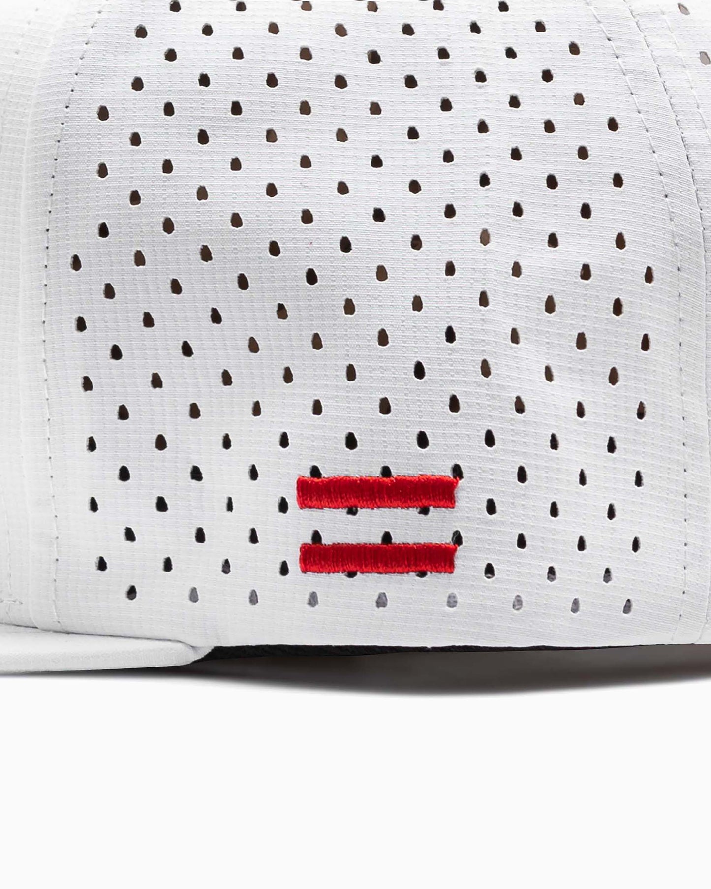 side of hat with two red woven stripes 