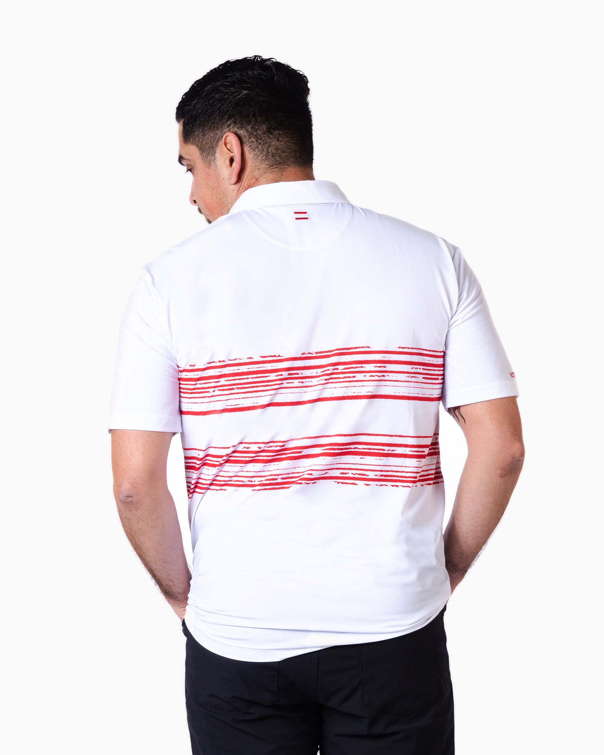 back of man wearing polo with two red woven stripes toward top