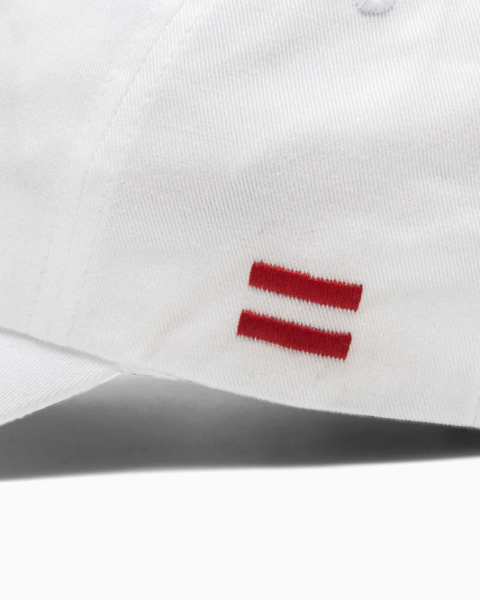 close up of side of hat with two red woven stripes 