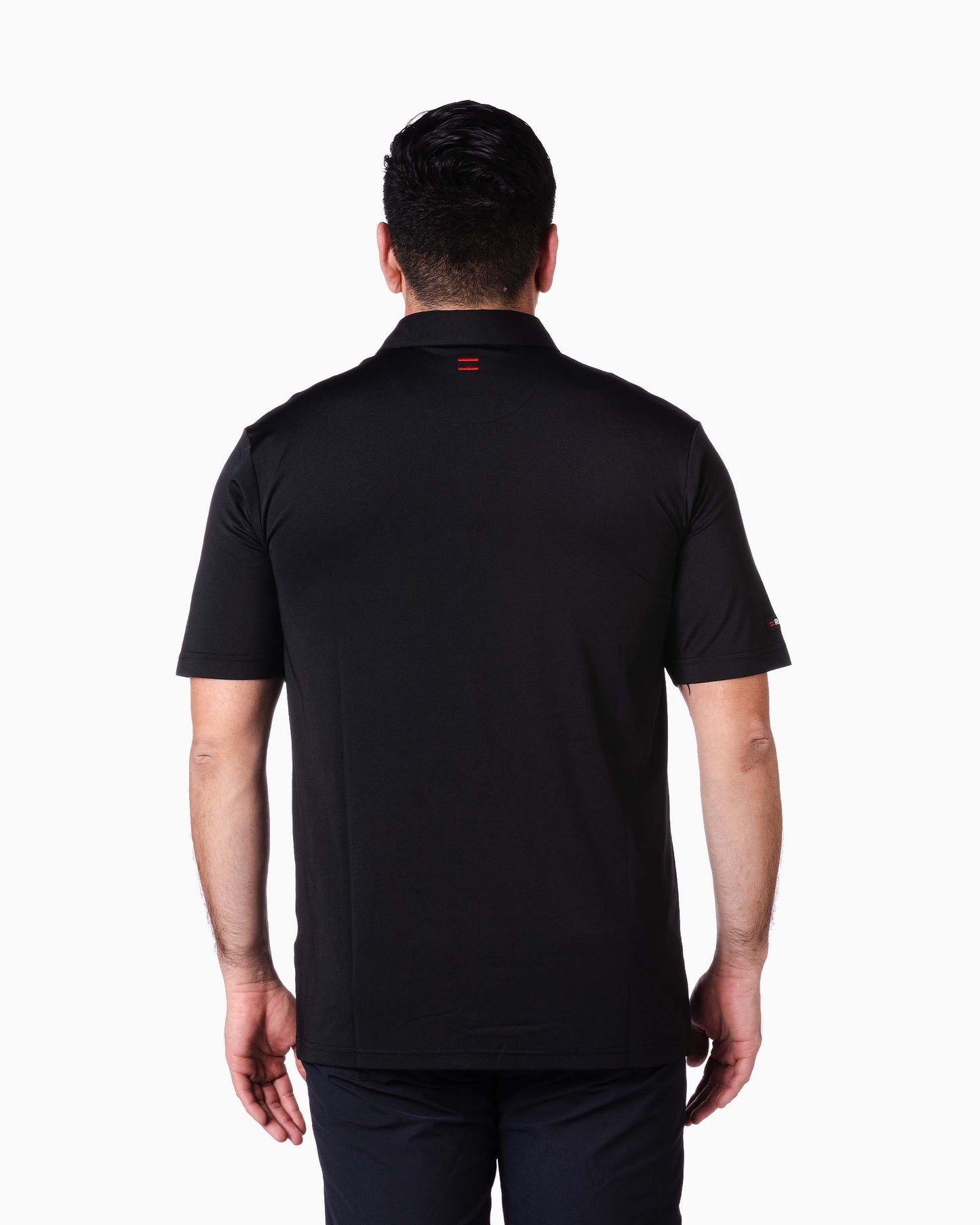 back of man wearing black polo with two red woven stripes on neck