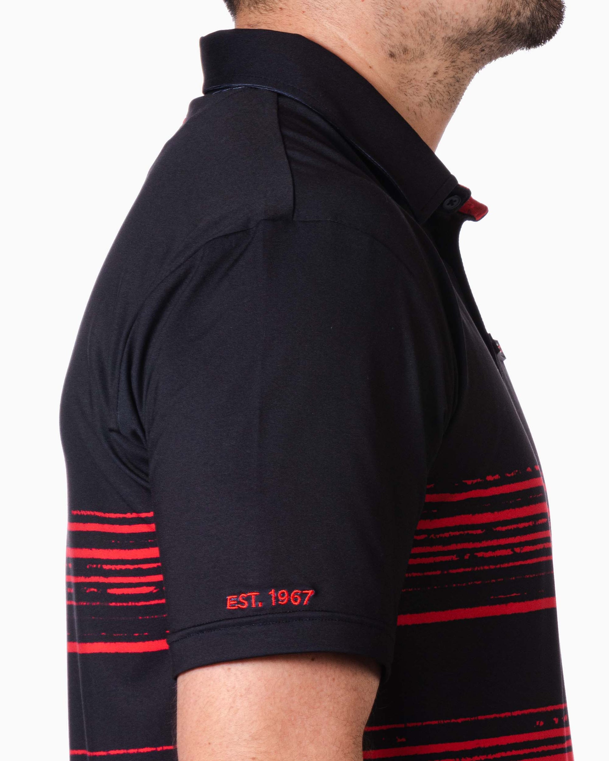 close up of sleeve with red embroidered "est. 1967"
