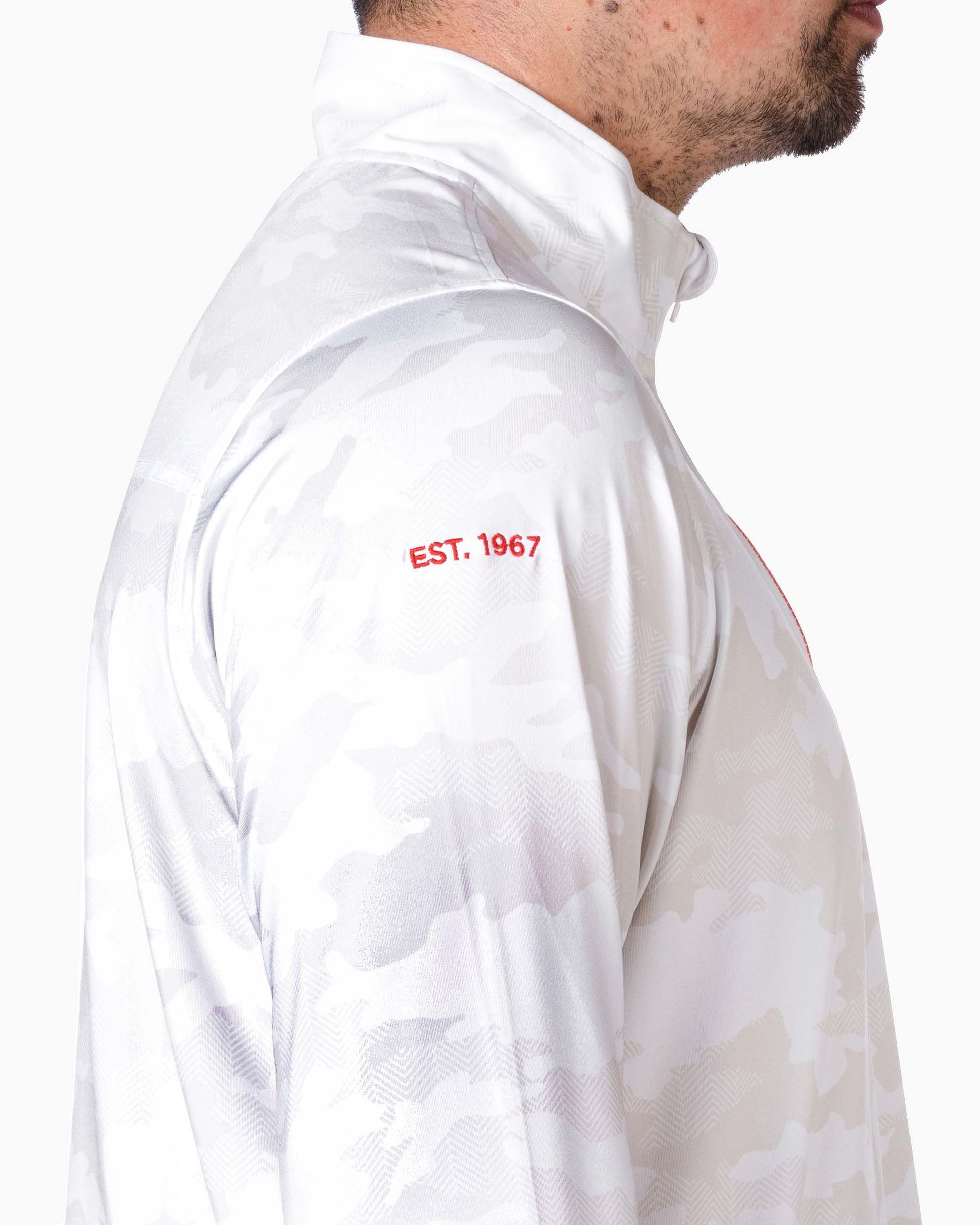 close up of sleeve with red embroidered "est. 1967"